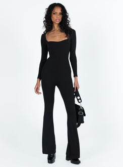 Long sleeve jumpsuit Ribbed material Square neckline Cut out at back with tie fastening Good stretch Partially lined