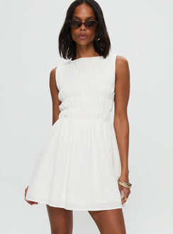 back view of model wearing Princess Polly Melona Shirred Mini Dress White Boat Neck 