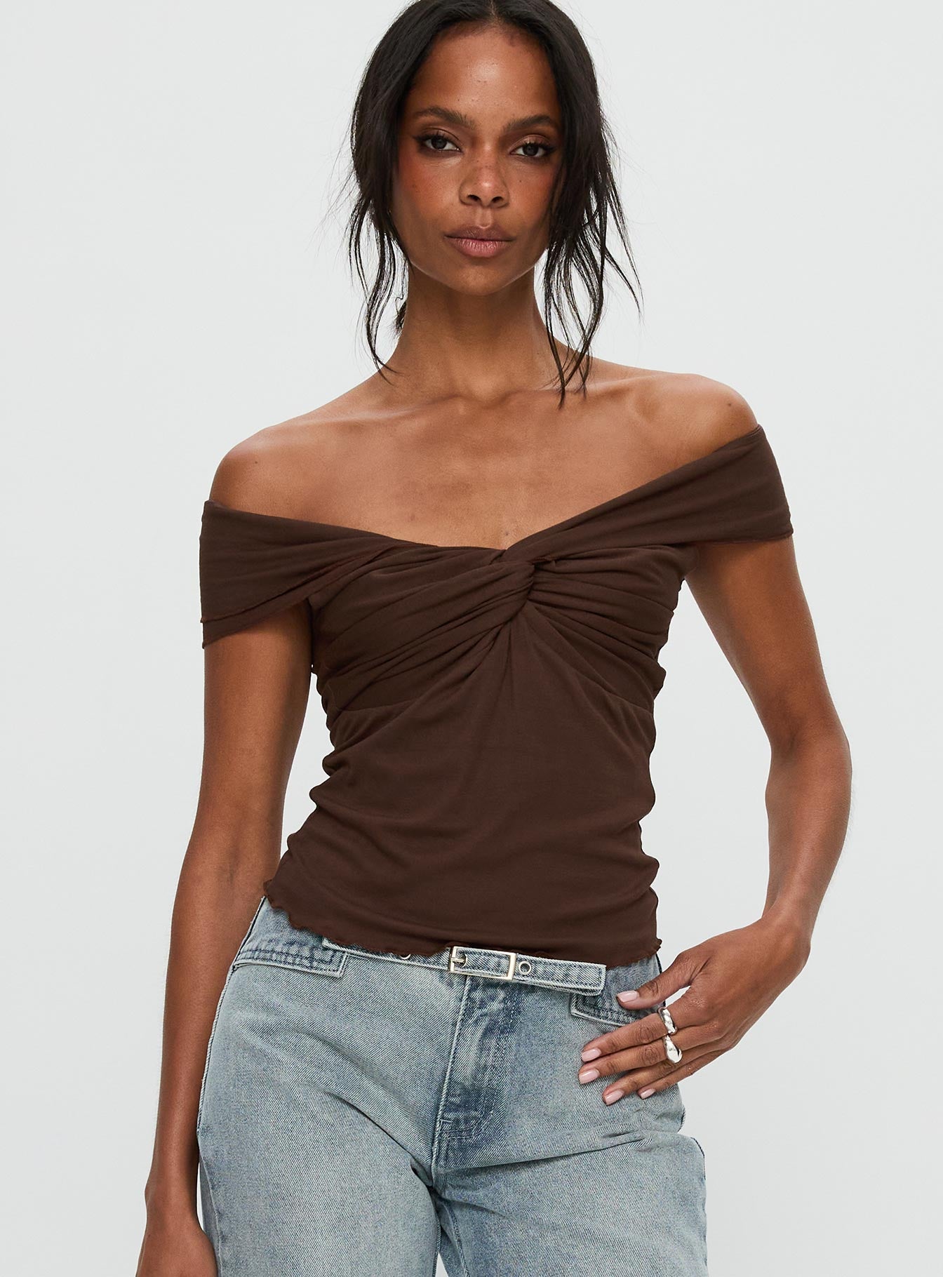 front view of model wearing Princess Polly Suspiria Twist Off Shoulder Top Chocolate Short Sleeves V-Neck 