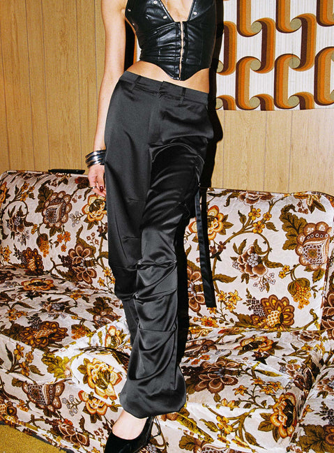 side view of model wearing Princess Polly Butterfly Cargo Pants Onyx High Waisted Pants 