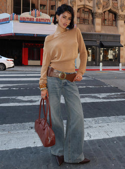 front view of model wearing Princess Polly Zaralyn Low Rise Wide Leg Jeans Mid Blue Wash Low Rise Jeans 