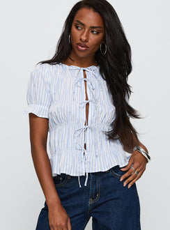 front view of model wearing Princess Polly Alistair Bow Tie Top Blue / White Stripe Short Sleeves Crew Neck 