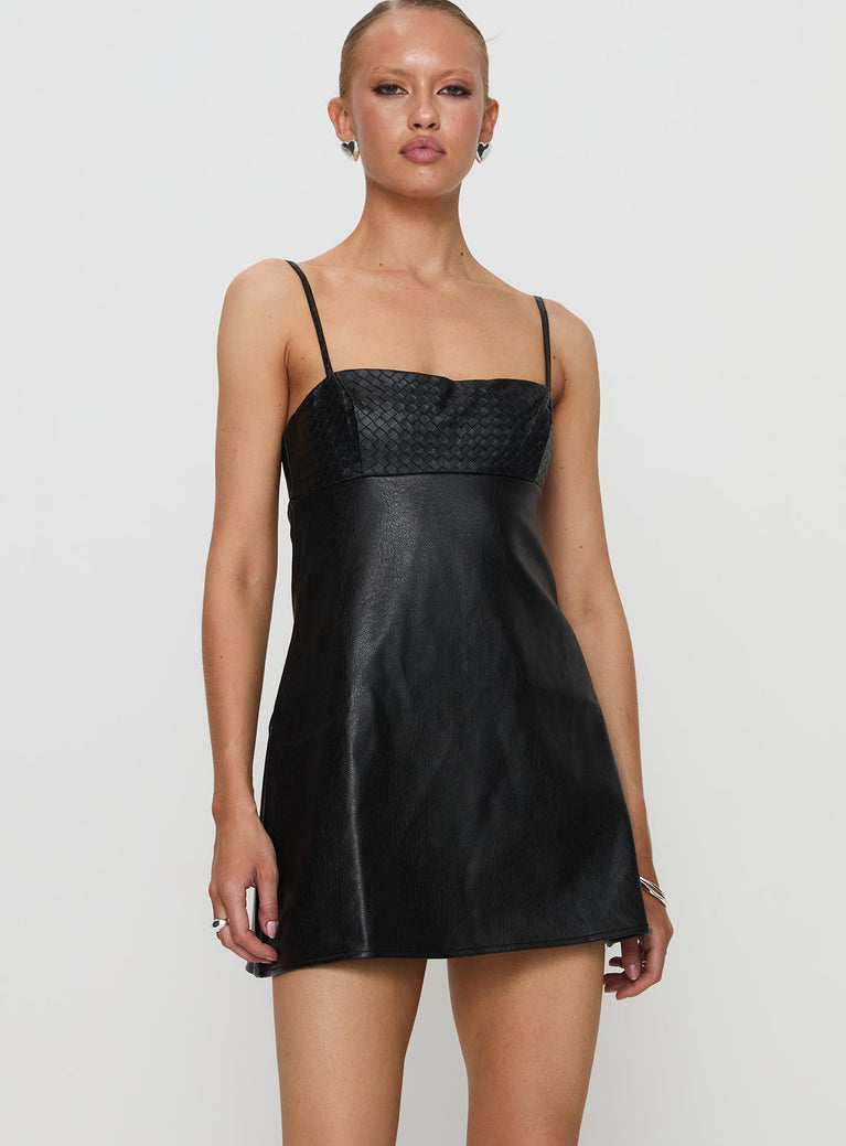 front view of model wearing Princess Polly Isak Woven Faux Leather Mini Dress Black Square Neck 