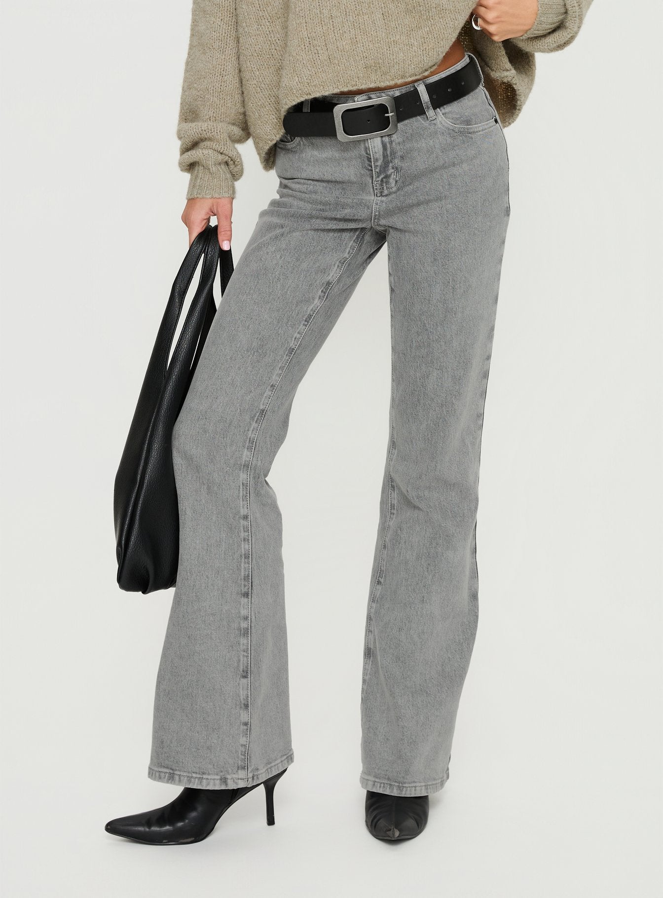 back view of model wearing Princess Polly Magic Mirror Mid Rise Bootleg Jeans Washed Grey Mid Rise Jeans 