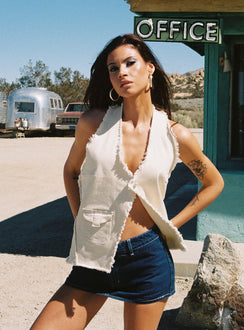 front view of model wearing Princess Polly Shade Halter Top Cream Sleeveless Plunger 