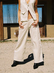 back view of model wearing Princess Polly Kiaan Low Rise Wide Leg Pants Cream Low Rise Pants 