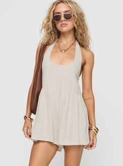 Romper Halter neck tie fastening, scooped neckline, low back, invisible zip fastening at side, twin hip pockets Non-stretch, unlined