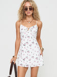 Mini dress Floral print, adjustable shoulder straps, tie fastening at bust, invisible zip fastening at back Fully lined, non-stretch Princess Polly Lower Impact