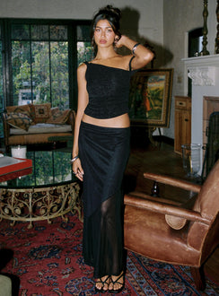   side view of model wearing Princess Polly Dauntless Sheer Maxi Skirt Black Maxi 
