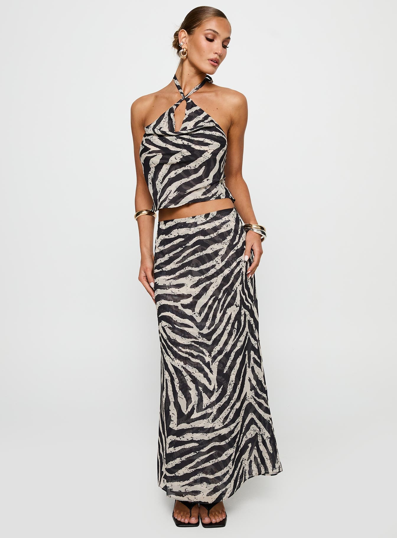   front view of model wearing Princess Polly Eleganza Maxi Skirt Zebra Maxi 