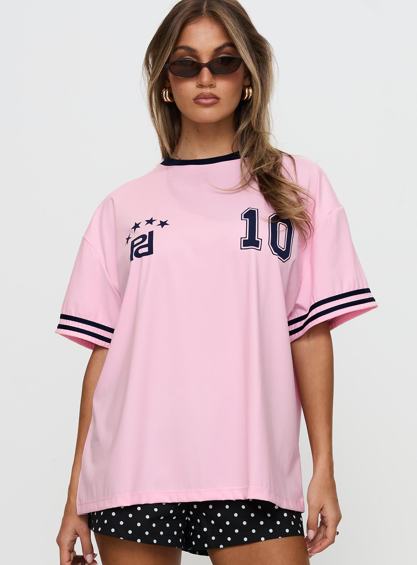 front view of model wearing Princess Polly Cornwall Football Jersey Pink Half Sleeves Crew Neck 