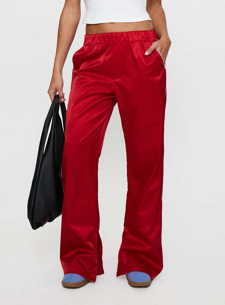 back view of model wearing Princess Polly Travalta Satin Track Pant Red Low Rise Pants 