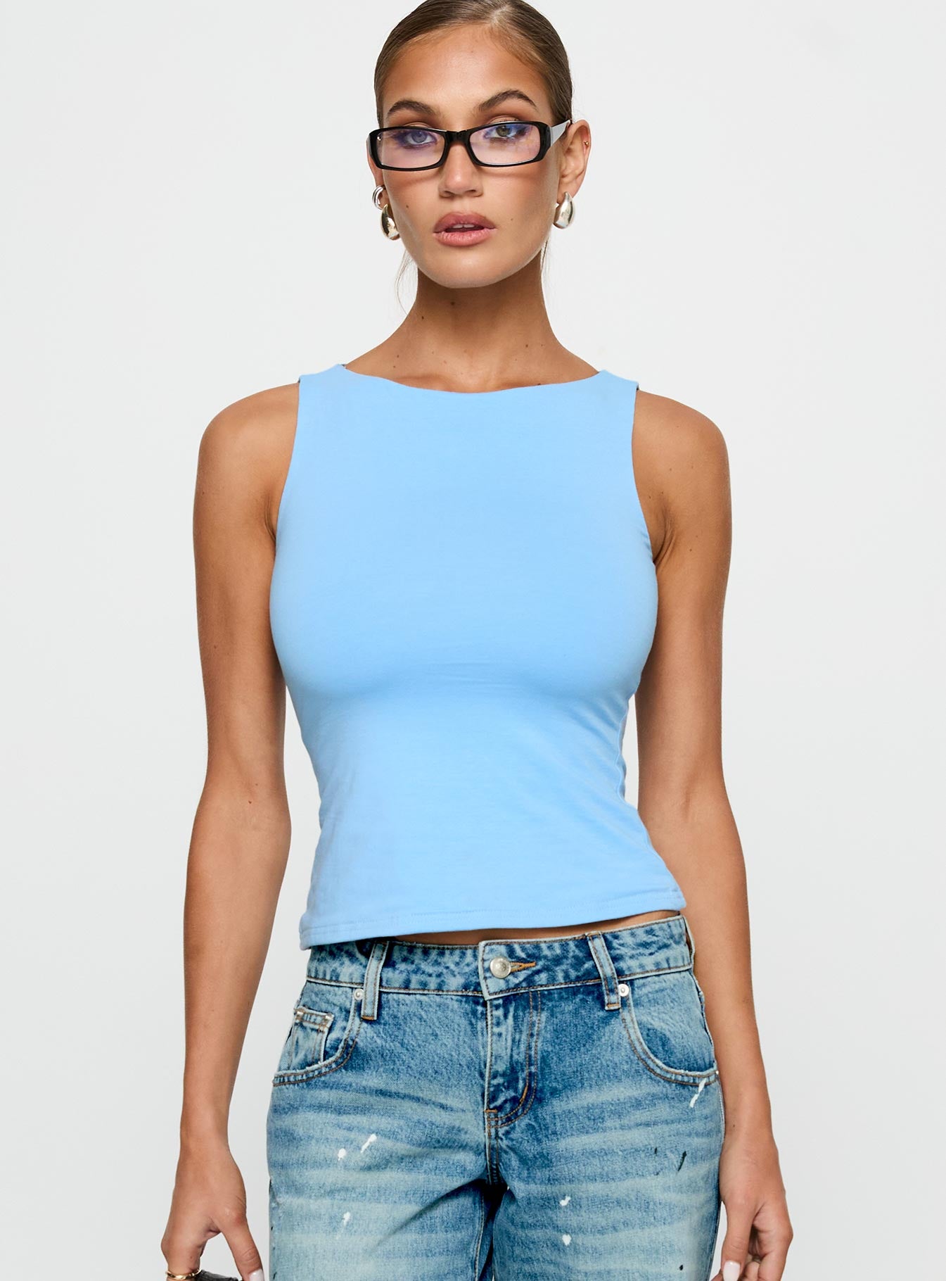 front view of model wearing Princess Polly Lose Your Number High Neck Top Blue Sleeveless Crew Neck 