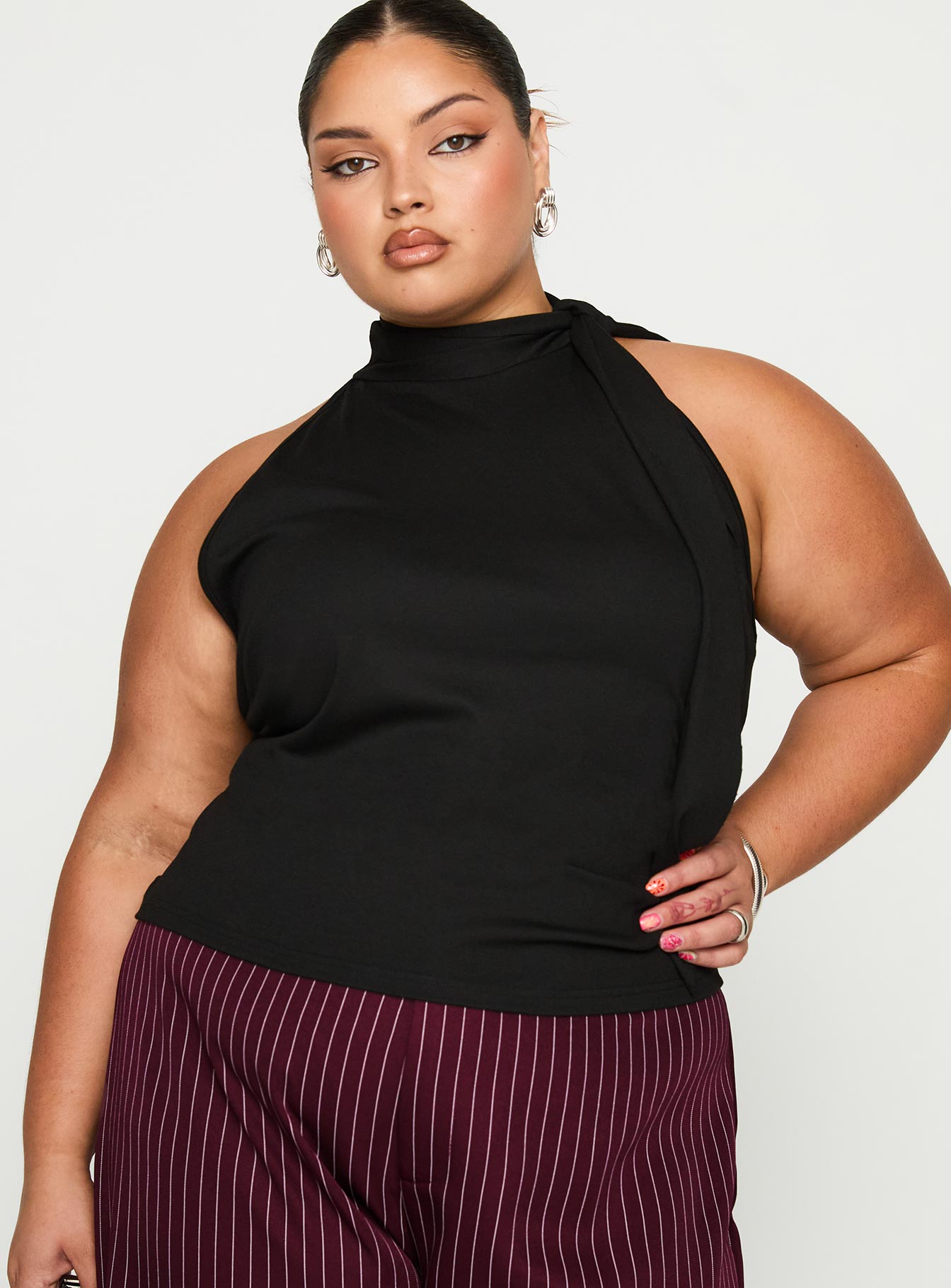 front view of model wearing Princess Polly Mathias Top Black Curve Sleeveless High Neck 