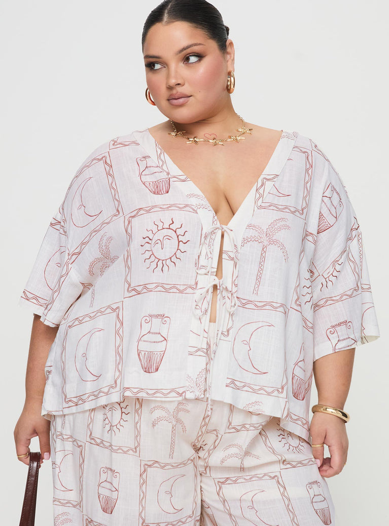 front view of model wearing Princess Polly Sun Dream Shirt Cream / Multi Curve Three Fourth Sleeves Plunger 