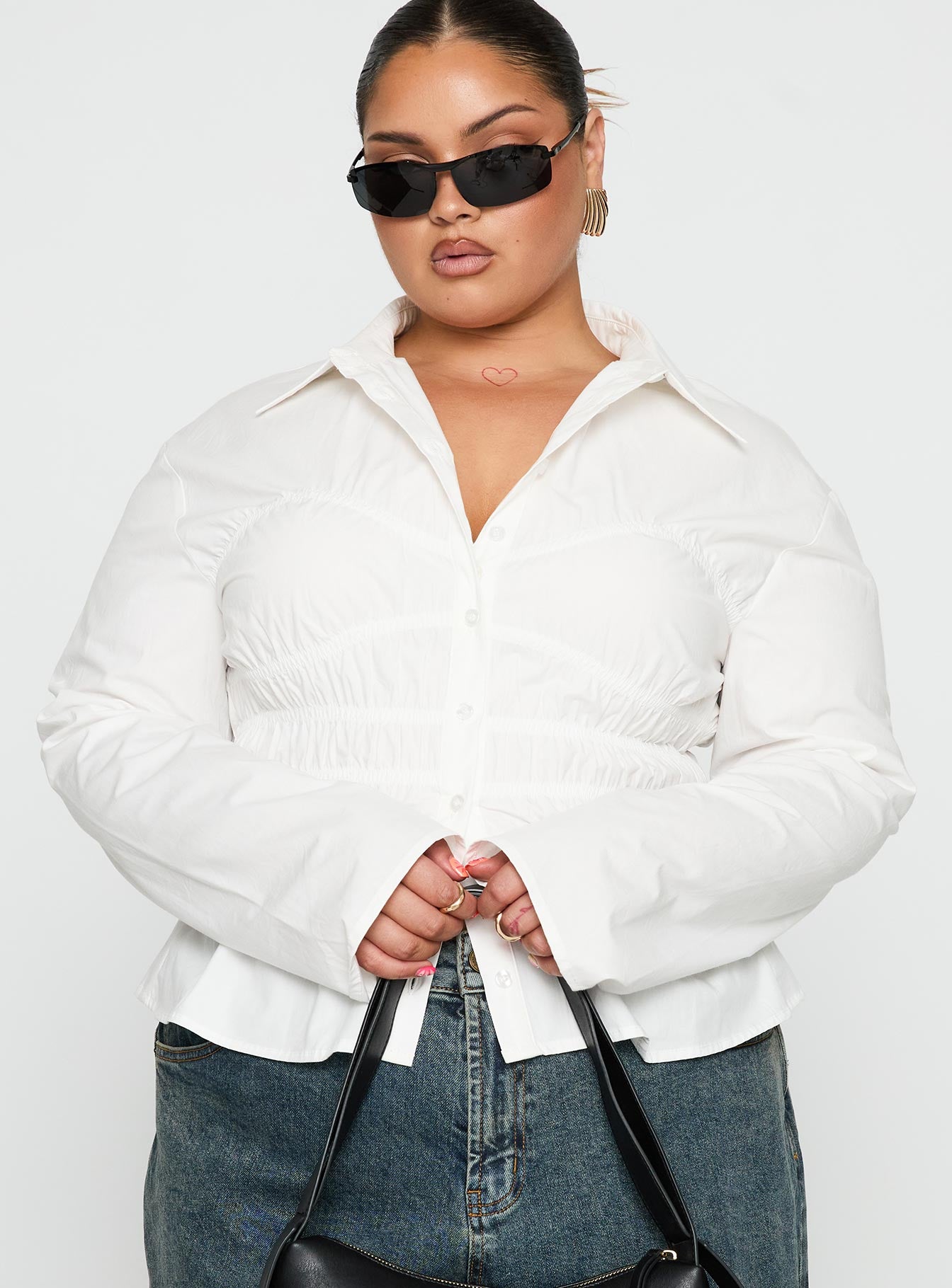 front view of model wearing Princess Polly Liesel Shirred Long Sleeve Top White Curve Full Sleeves V-Neck 