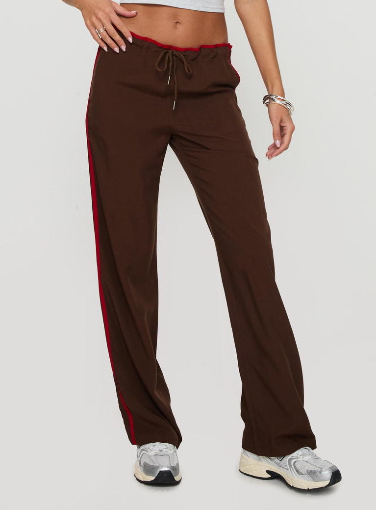 front view of model wearing Princess Polly Maranie Pants Brown / Red Low Rise Pants 