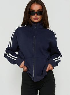 Crafted from fleece, the Keeran Funnel Neck Jumper Navy / White in womens category with short length side view of model wearing Princess Polly