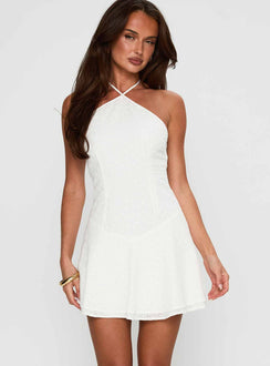 front view of model wearing Princess Polly Flowerchild Halter Mini Dress White Asymmetric Neckline 