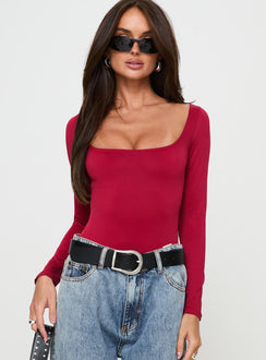 front view of model wearing Princess Polly Ellery Bodysuit Red Long Sleeve Tops 