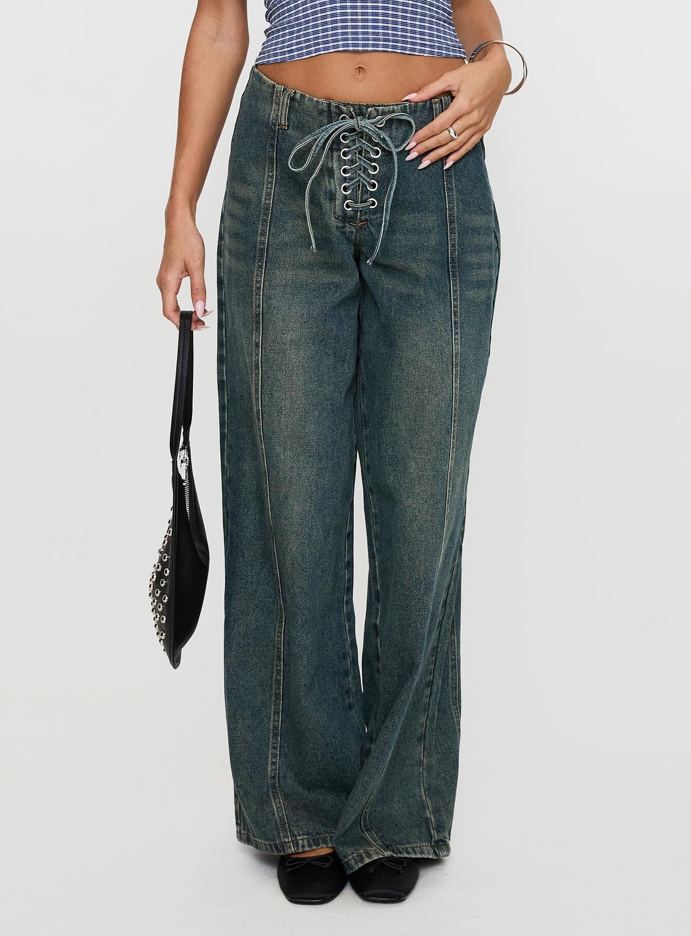 back view of model wearing Princess Polly San Mateo Tie Up Jeans Vintage Wash Low Rise Jeans 