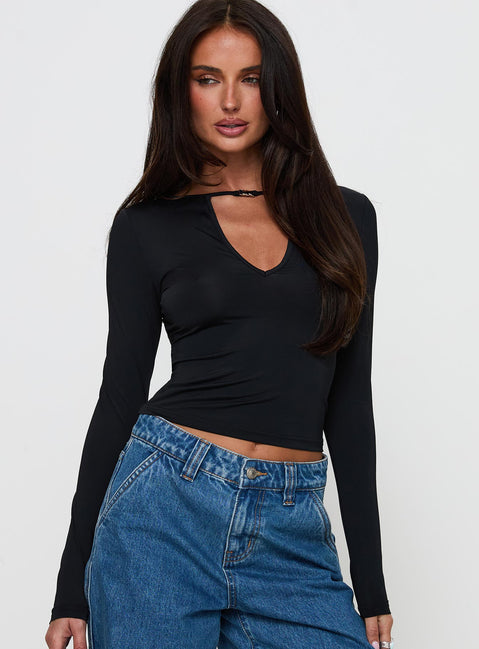 front view of model wearing Princess Polly Layna Long Sleeve Plunge Neck Top Black Full Sleeves V-Neck 