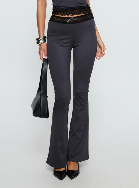 side view of model wearing Princess Polly Georganna Lace Trim Flare Pant Charcoal High Rise Pants 