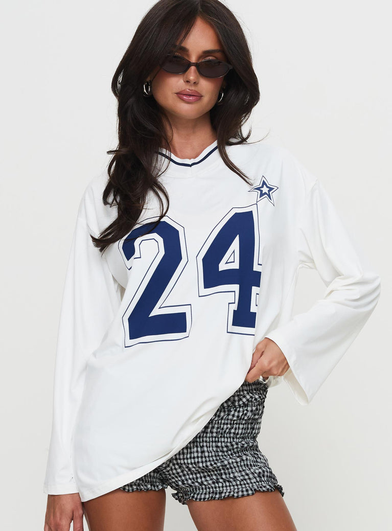 front view of model wearing Princess Polly Star Player Long Sleeve Top White Full Sleeves V-Neck 