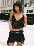   side view of model wearing Princess Polly Ayra Lace Mini Skirt Black Mini Skirts 