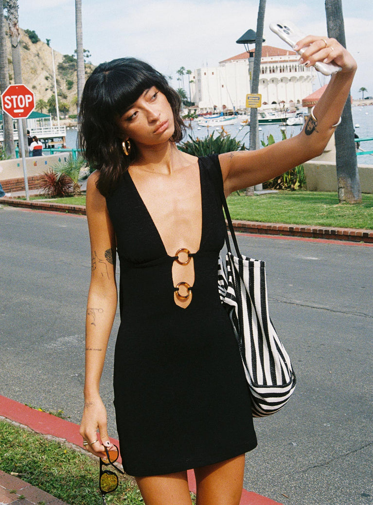 front view of model wearing Princess Polly Steward Halter Mini Dress Black Tall Plunger 