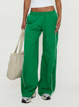 back view of model wearing Princess Polly Field Day Track Pants Green High Waisted Pants 