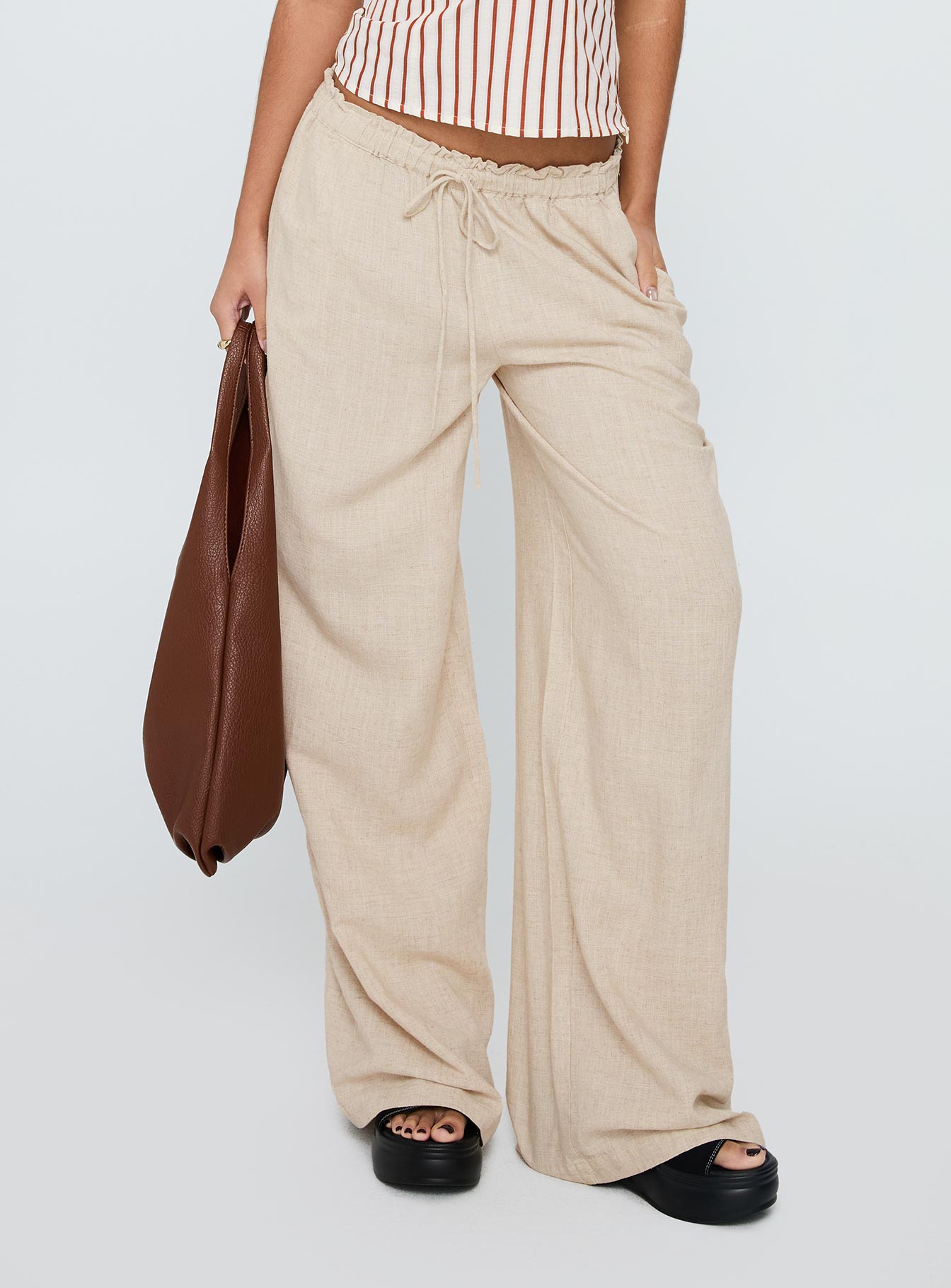 side view of model wearing Princess Polly Seascape Oversize Tie Pants Natural High Waisted Pants 
