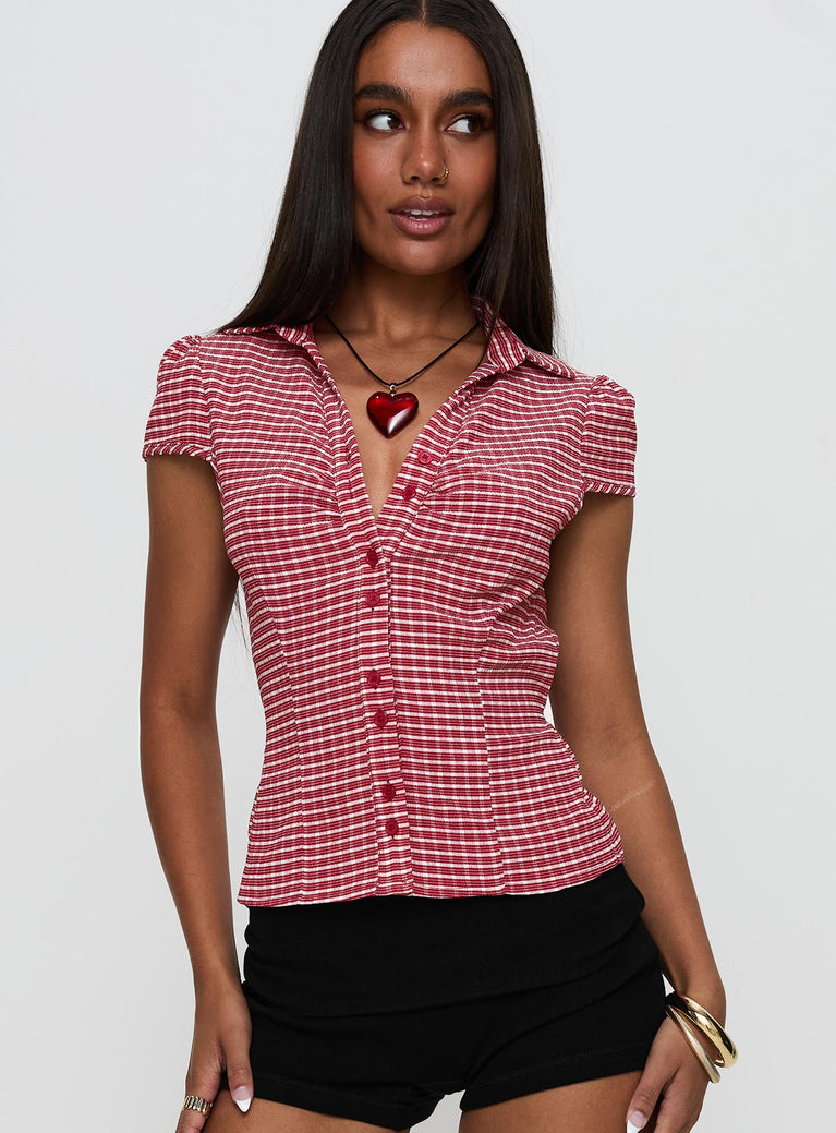 front view of model wearing Princess Polly Arianwyn Top Red Check Short Sleeves V-Neck 