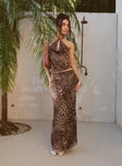   side view of model wearing Princess Polly Eleganza Maxi Skirt Leopard Petite Maxi 