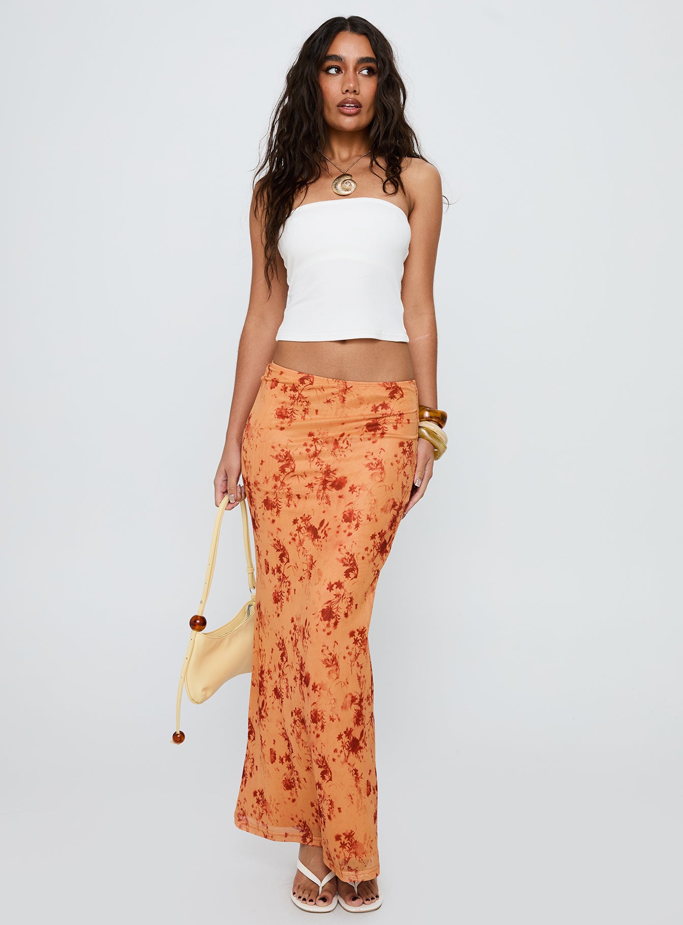   front view of model wearing Princess Polly Shepherd Maxi Skirt Orange Multi Maxi 