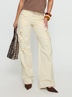 back view of model wearing Princess Polly Remmi Cargo Pants Cream Mid Rise Pants 