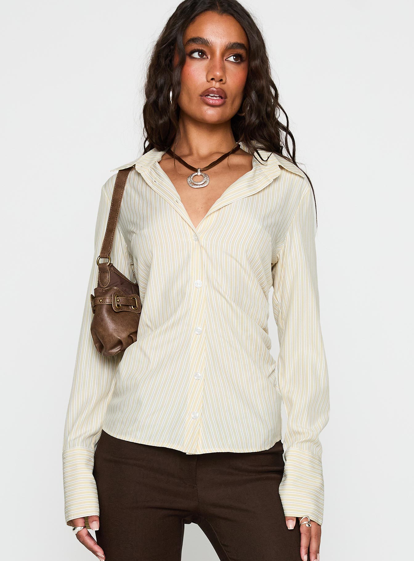 front view of model wearing Princess Polly Rush Hour Long Sleeve Top Yellow Stripe Full Sleeves V-Neck 
