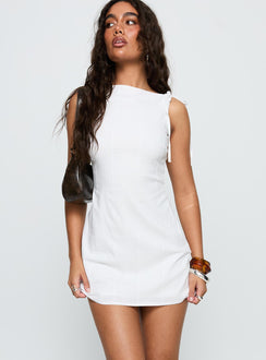 side view of model wearing Princess Polly Kaeli Keyhole Mini Dress White High Neck 