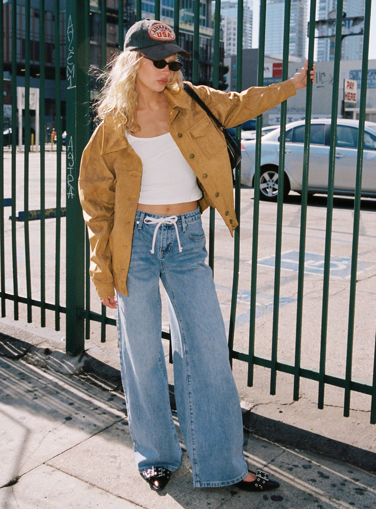 front view of model wearing Princess Polly Mellowed Out Slouchy Jeans Mid Blue High Waisted 