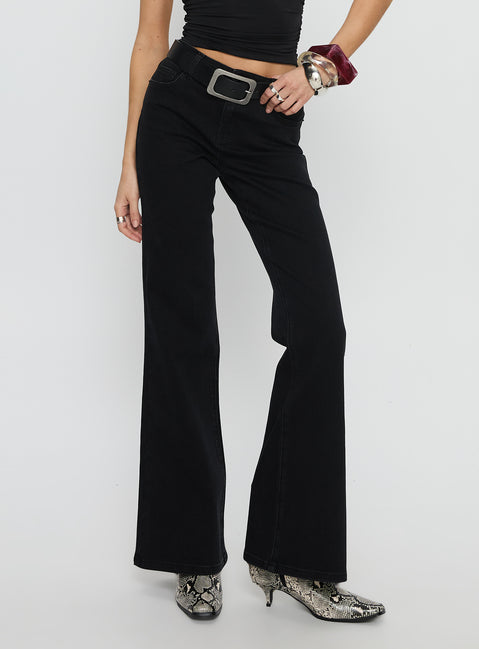 front view of model wearing Princess Polly Magic Mirror Mid Rise Bootleg Jeans Washed Black Mid Rise Jeans 