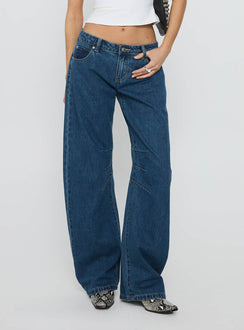 side view of model wearing Princess Polly Lost Track Mid Rise Barrel Leg Jeans Mid Wash Mid Rise Jeans 