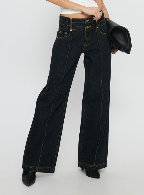 side view of model wearing Princess Polly Hannalee Low Rise Wide Leg Cargo Jeans Grunge Wash Low Rise Jeans 