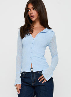front view of model wearing Princess Polly Finnean Long Sleeve Top Pale Blue Full Sleeves V-Neck 