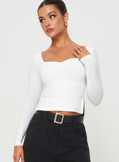 Front view of model wearing  front Princess Polly Full Sleeves Asymmetric Neckline  Rehna Long Sleeve Top White