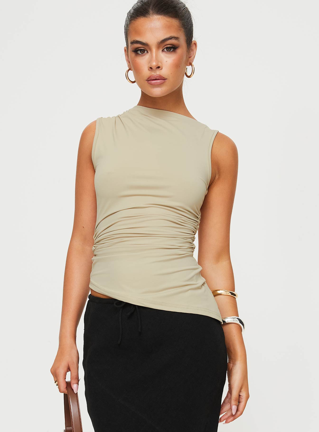 front view of model wearing Princess Polly Jassie Top Beige Sleeveless Asymmetric Neckline 