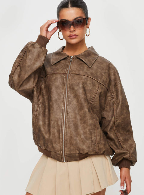 Bomber jacket  Faux leather material, oversized fit, classic collar, ribbed waistband and cuffs  Zip front fastening, twin hip pockets 