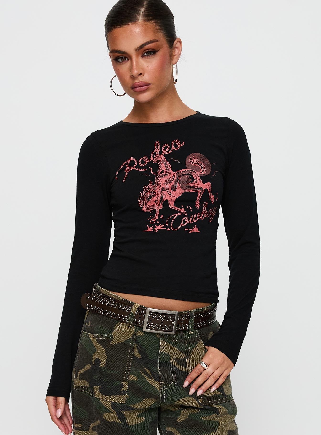 front view of model wearing Princess Polly Rodeo Cowboy Long Sleeve Top Washed Wine Full Sleeves Crew Neck 