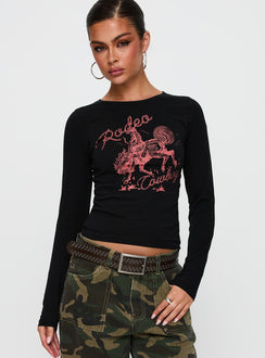 front view of model wearing Princess Polly Rodeo Cowboy Long Sleeve Top Washed Wine Full Sleeves Crew Neck 