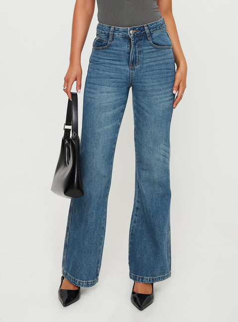 Front view of model wearing  front Princess Polly High Waisted  Maudie Boot Leg Jeans Mid Wash