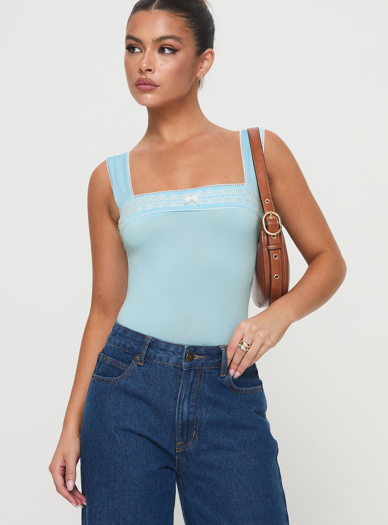 front view of model wearing Princess Polly Keating Bodysuit Baby Blue Sleeveless Square Neck 